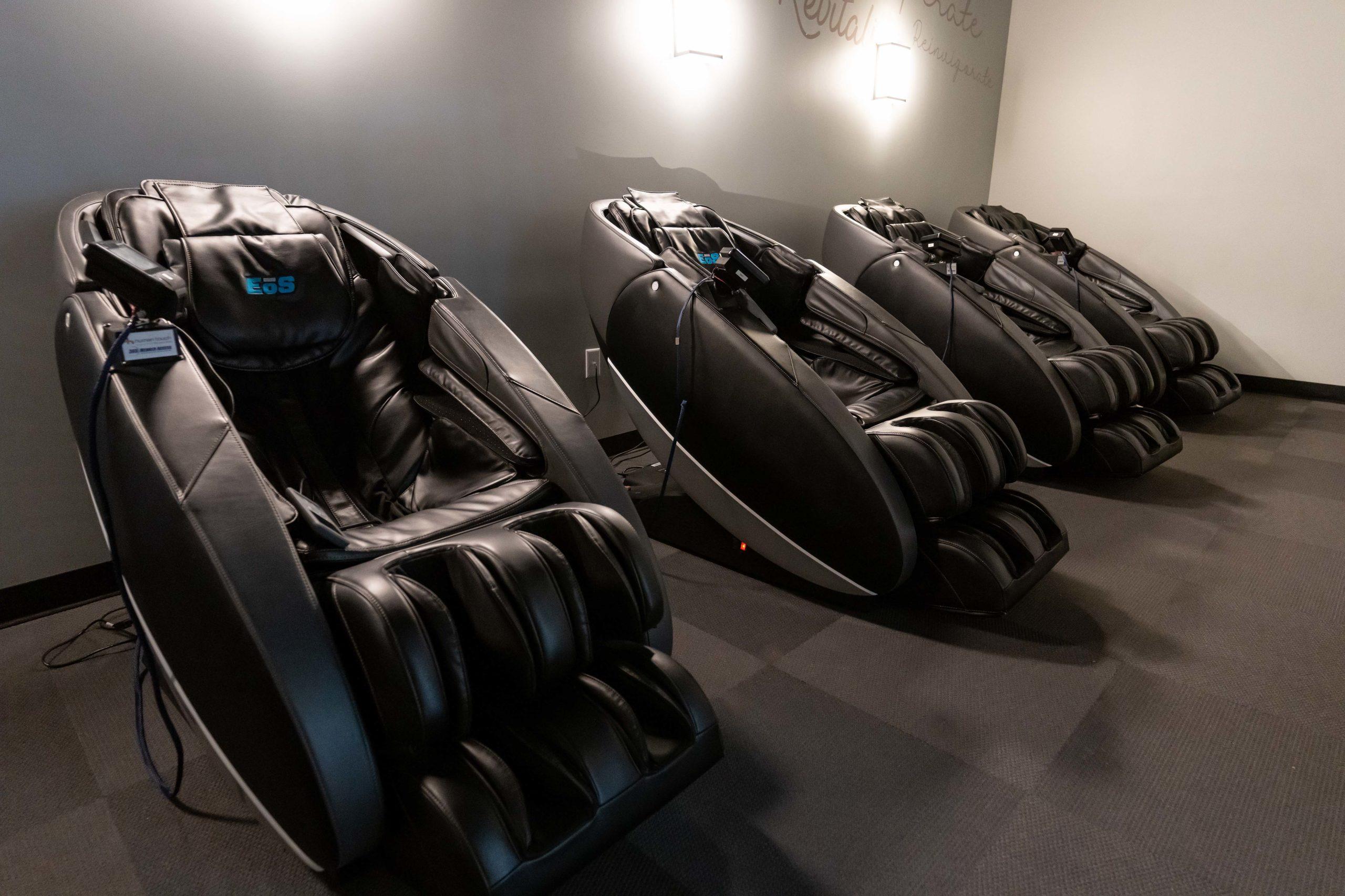 calming shot of several eos branded high tech massage chairs