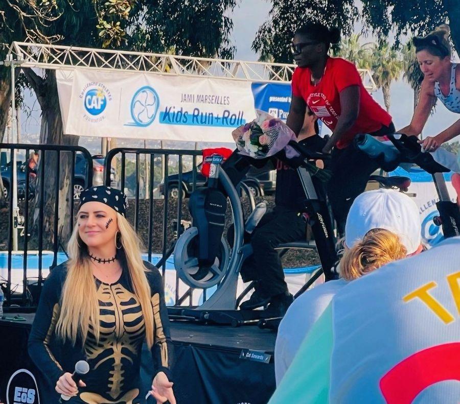 group of eos members outside in fun Halloween outfits 