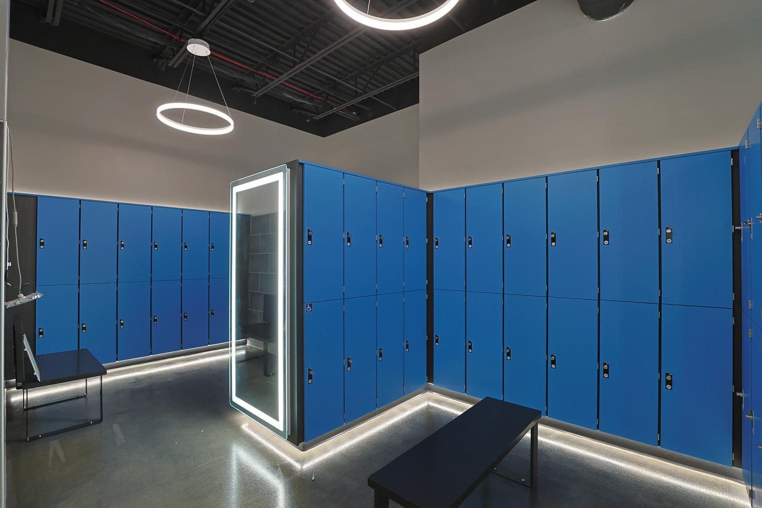 blue lockers inside a gym locker room