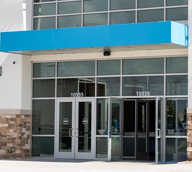 outside shot of eos gym in texas on a bright sunny day