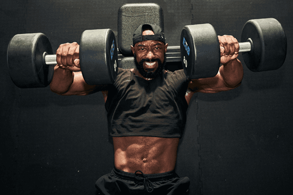 eos gym member performing sets and reps in the gym