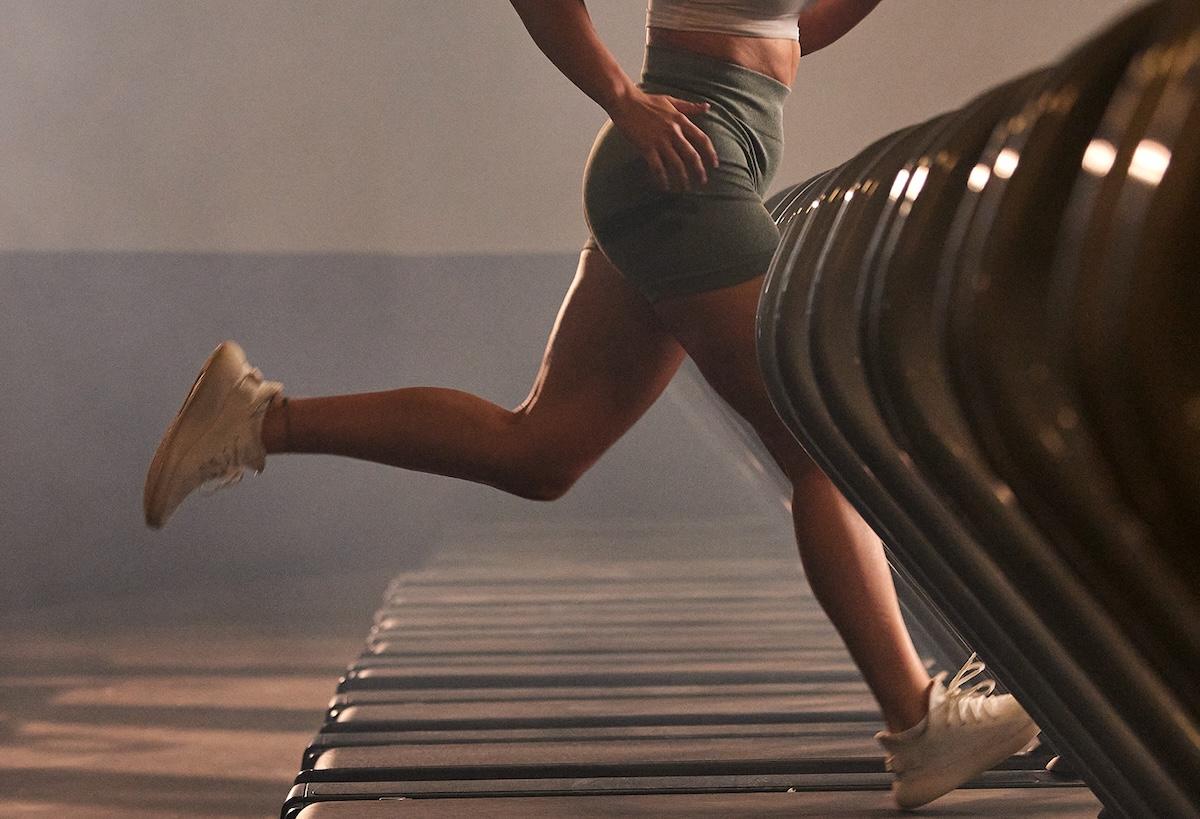 eos gym member running on a treadmill