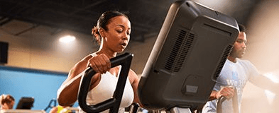 eos gym member on a piece of cardio equipment