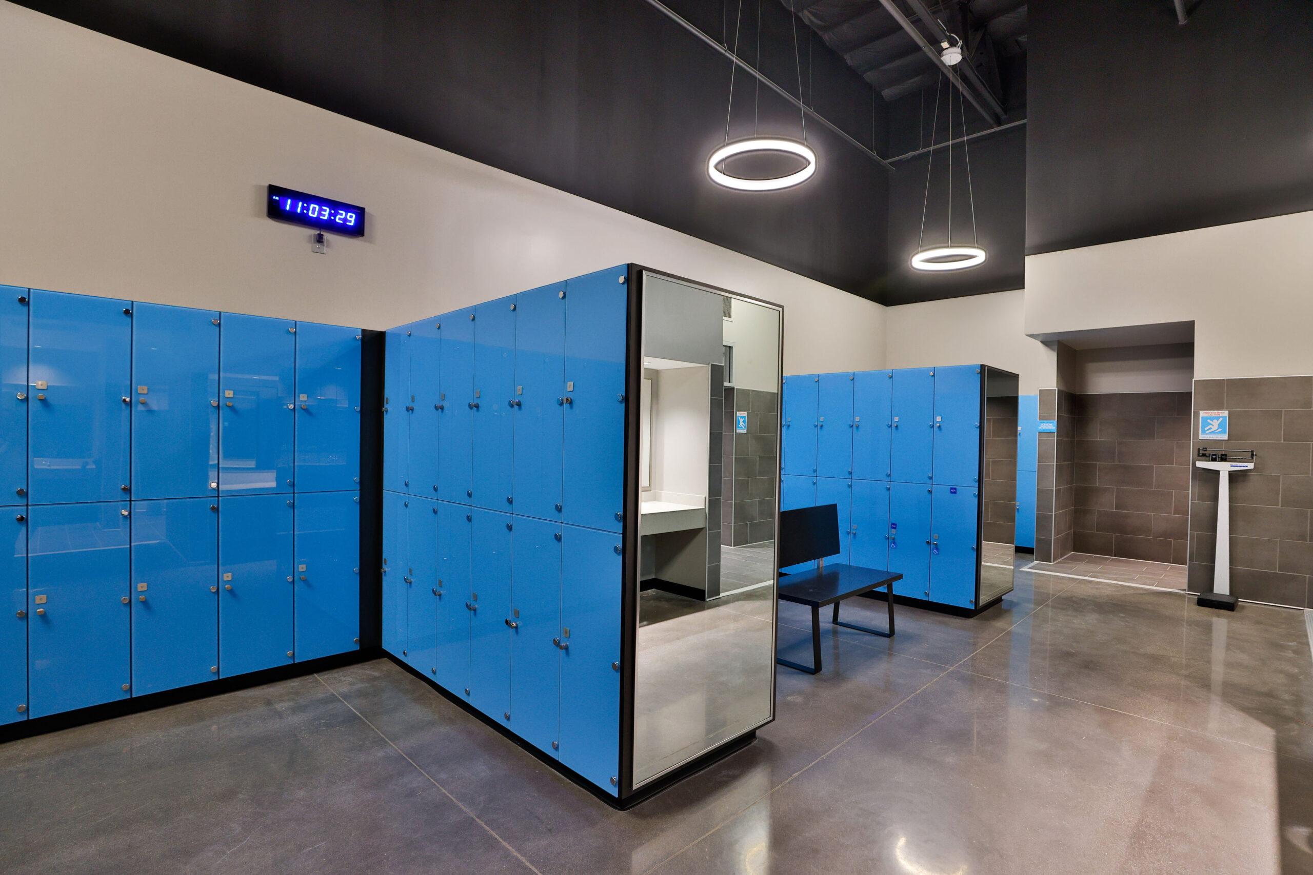a clean eos branded locker room with showers