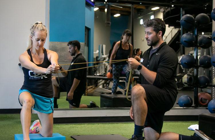 Woman working with Personal Trainer