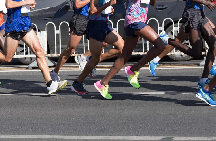 people running a race on an outdoor track