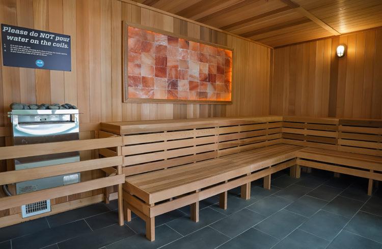 clean sauna with wooden paneling