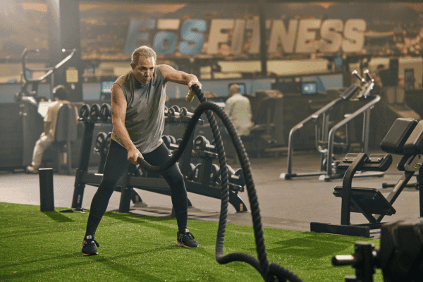 Senior working out at the gym
