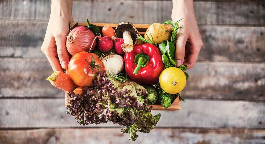 a basket full of fresh fruits and vegetables