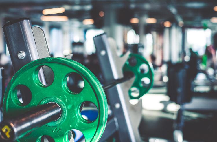 close up shot of barbell and weights