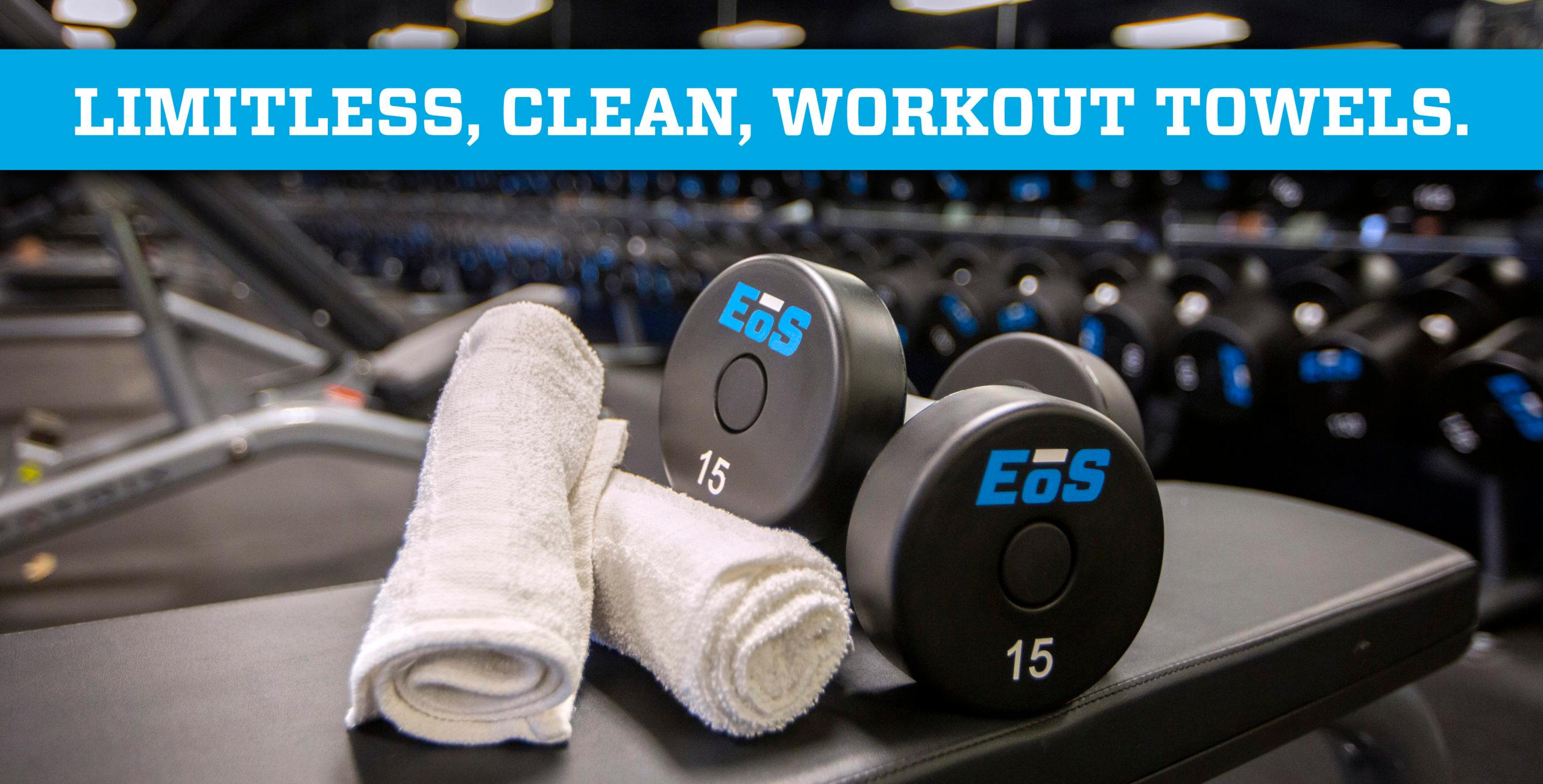 close up shot of eos branded towels and dumbbells