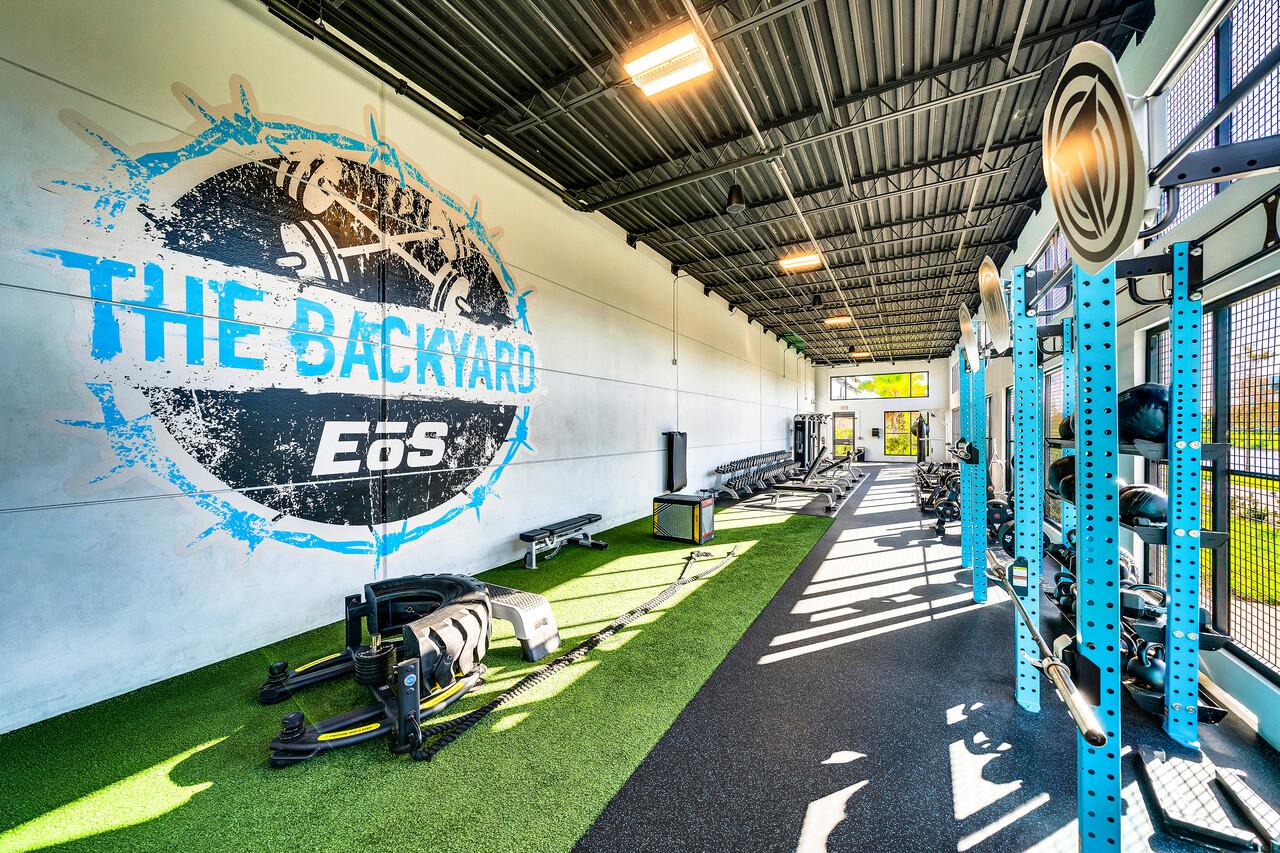 modern outdoor gym with eos branding on a sunny day