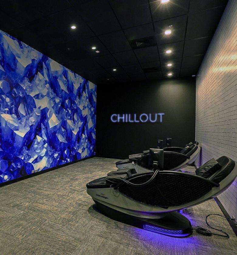 inside a modern cryo room with new chairs at a eos fitness gym