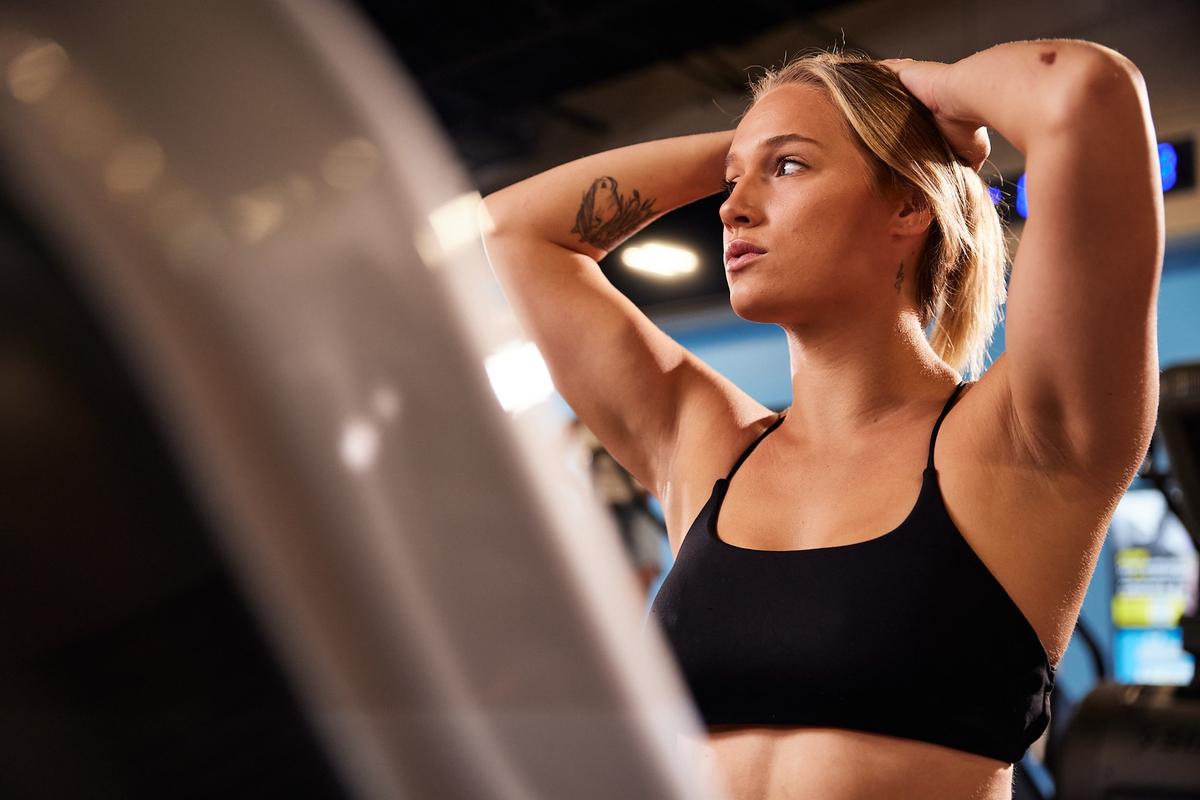 eos gym member working out on a treadmill