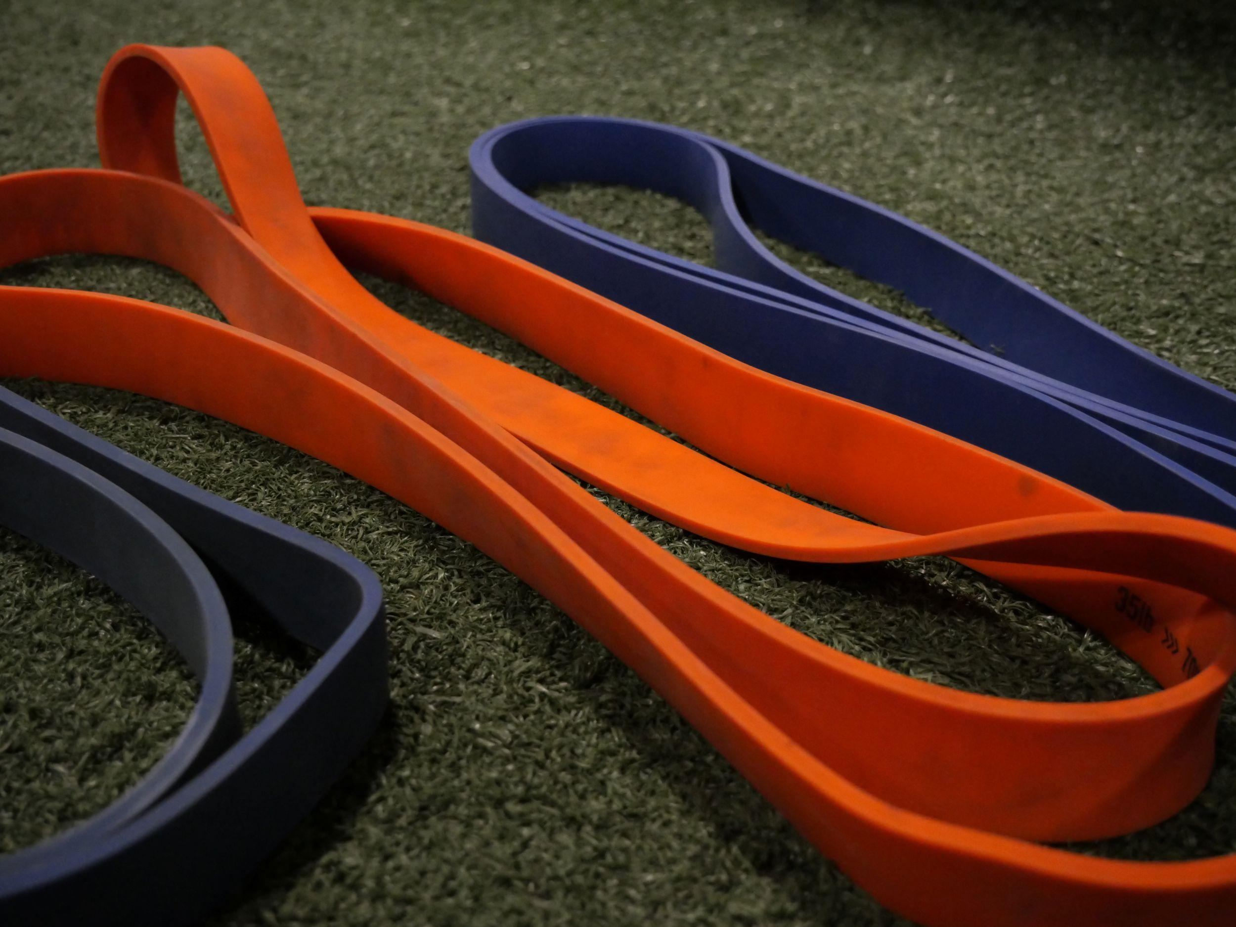 resistance bands on indoor turf