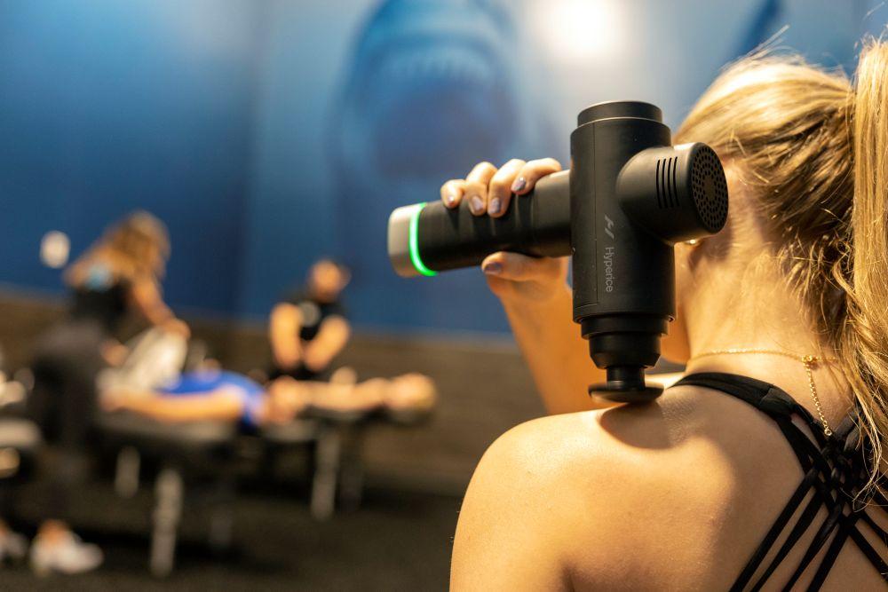 eos gym member using hyper volt gun