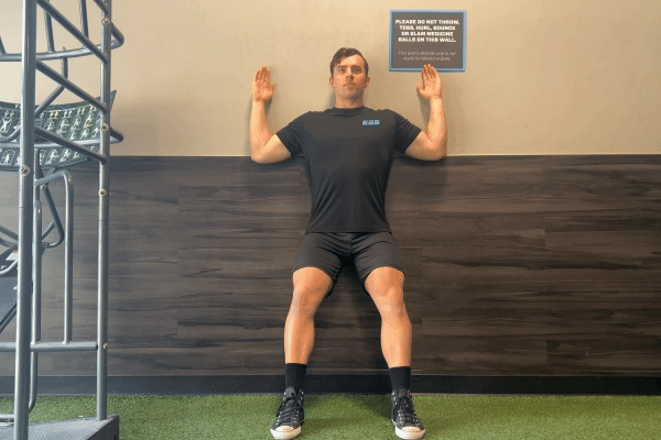 eos gym member doing wall angels