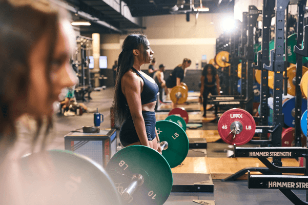 eos gym member pushing through deadlifts