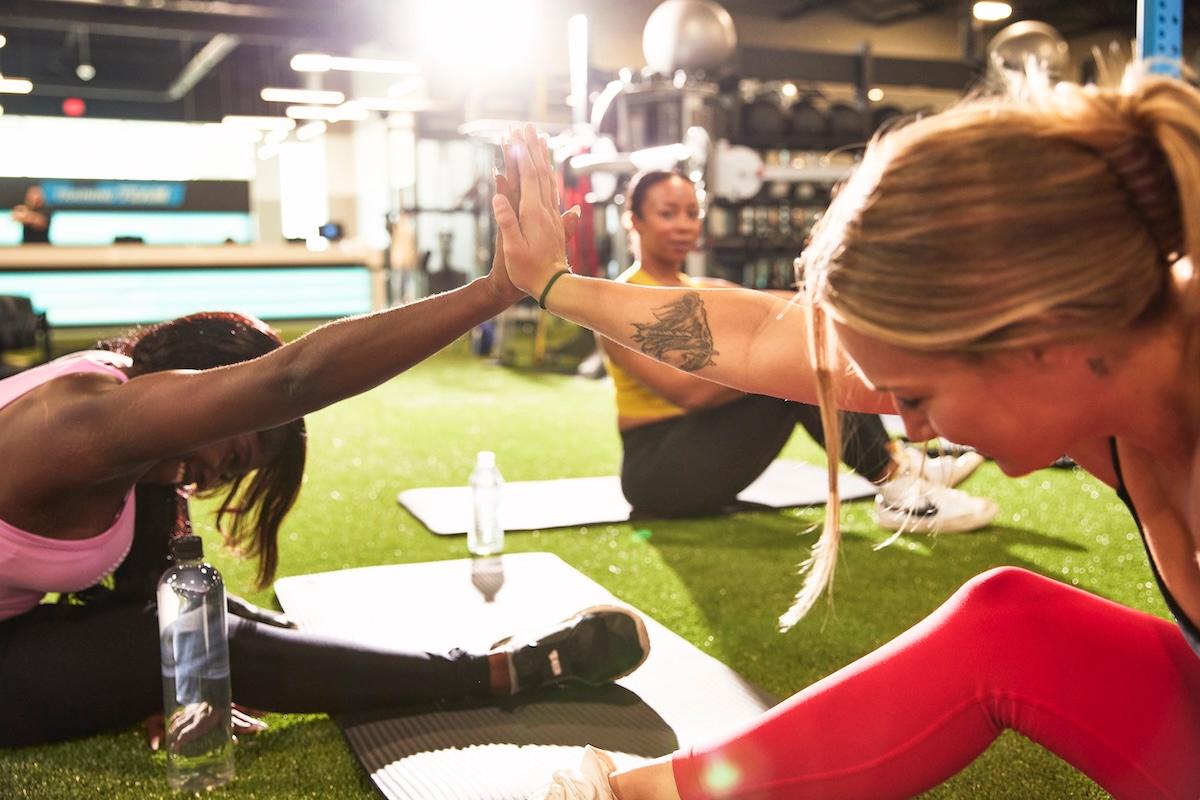 group of eos gym members working out together