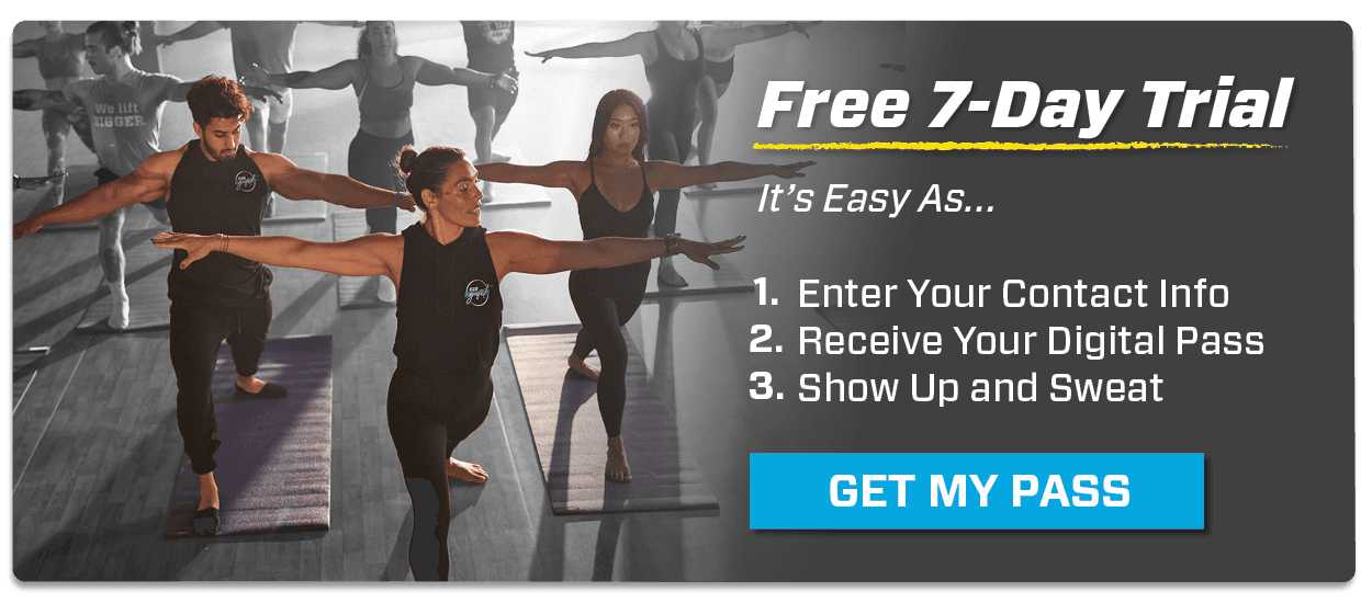 eos gym members doing yoga in a studio