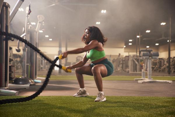 doing battle ropes in indoor turff