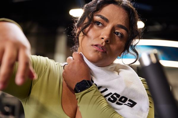 eos fitness gym member staying cool with a towel