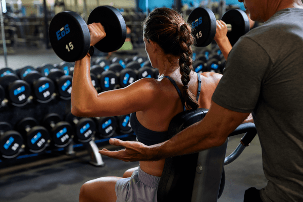 eos gym member spotting their partner