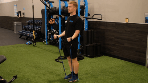 eos gym member doing bicep curls