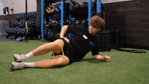 eos gym member doing calmshells