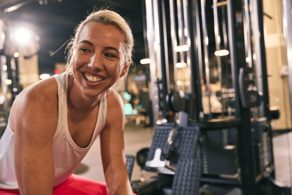 eos gym member excited after doing cable rows
