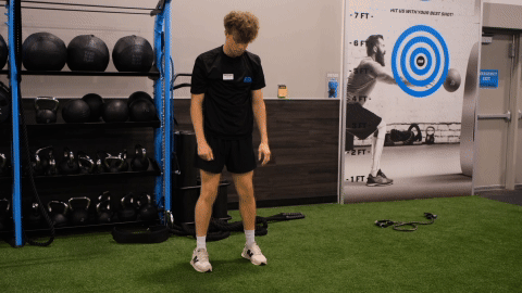 eos gym member doing ginch worms