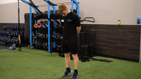 eos gym member doing calf raises