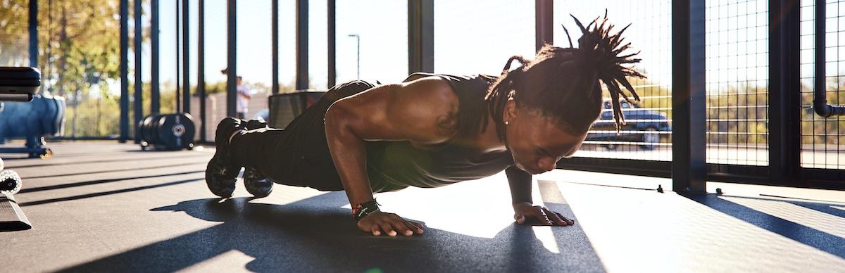 eos gym member doing a quick workout in the backyard