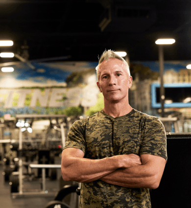 senior member working out in an eos fitness gym