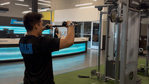 eos fitness member doing face pulls on cable machine