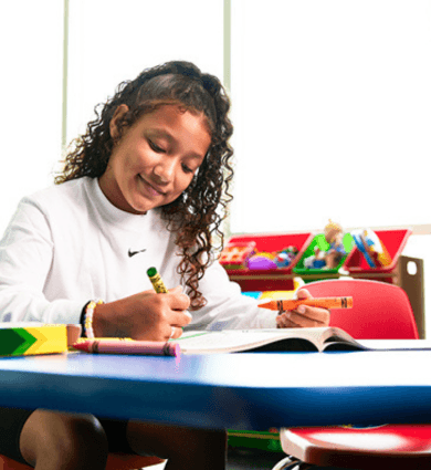Child playing in the EōS Kids’ Club daycare