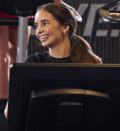 eos gym members walking on a treadmill
