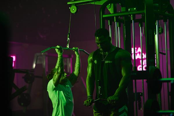 eos fitness members working out in the evening