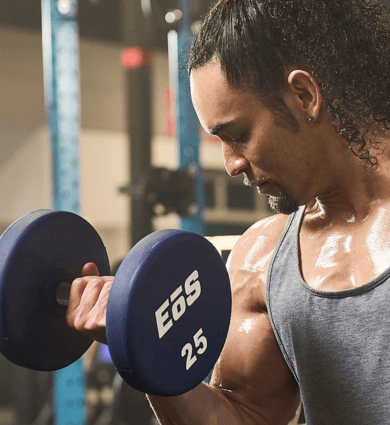 eos fitness member working our with free weights