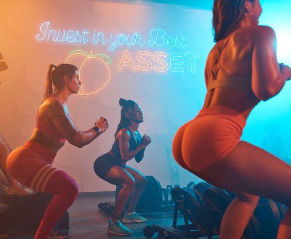 eos gym members squatting