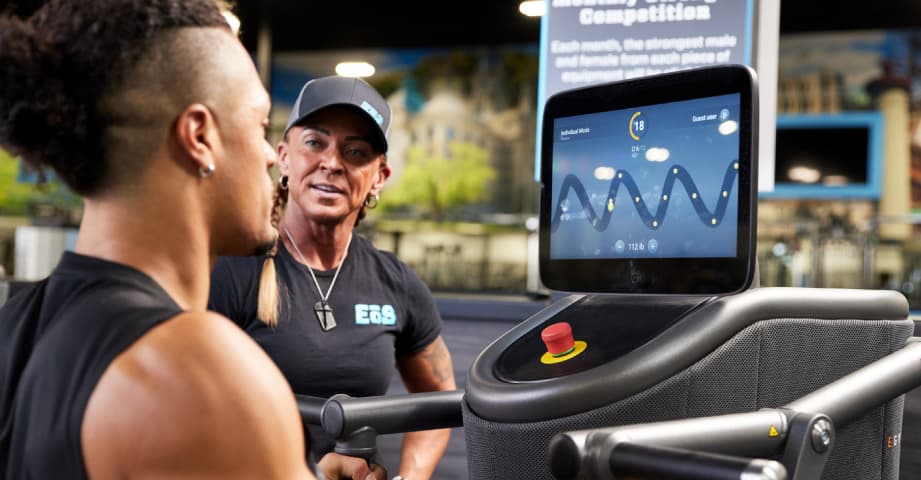 eos member being shown how to use smart strength