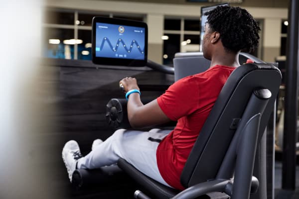 eos gym goer using smart strength equipment