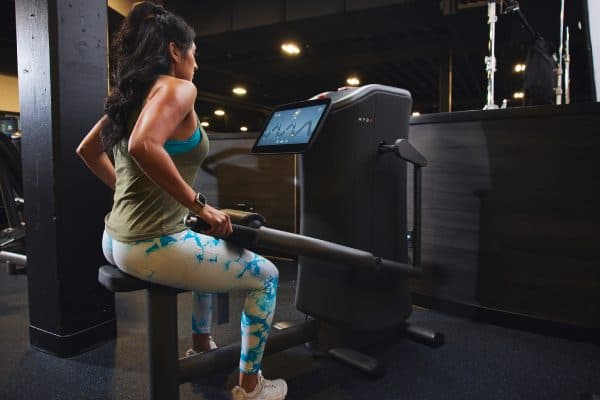 eos gym goer using smart strength equipment