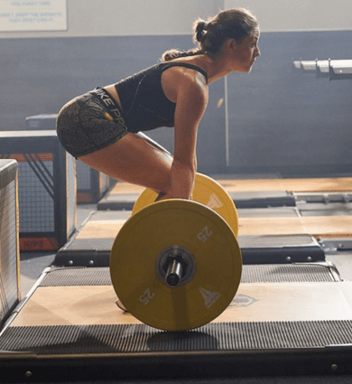 eos fitness members performing a deadlift